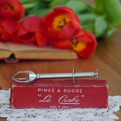 Pince à sucre "Hélasine" 3 griffes en métal argenté avec sa boîte d'origine Le Crabe